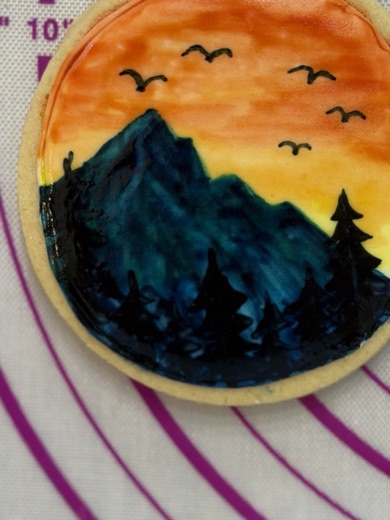 Hand-painted mountain sunset cookie